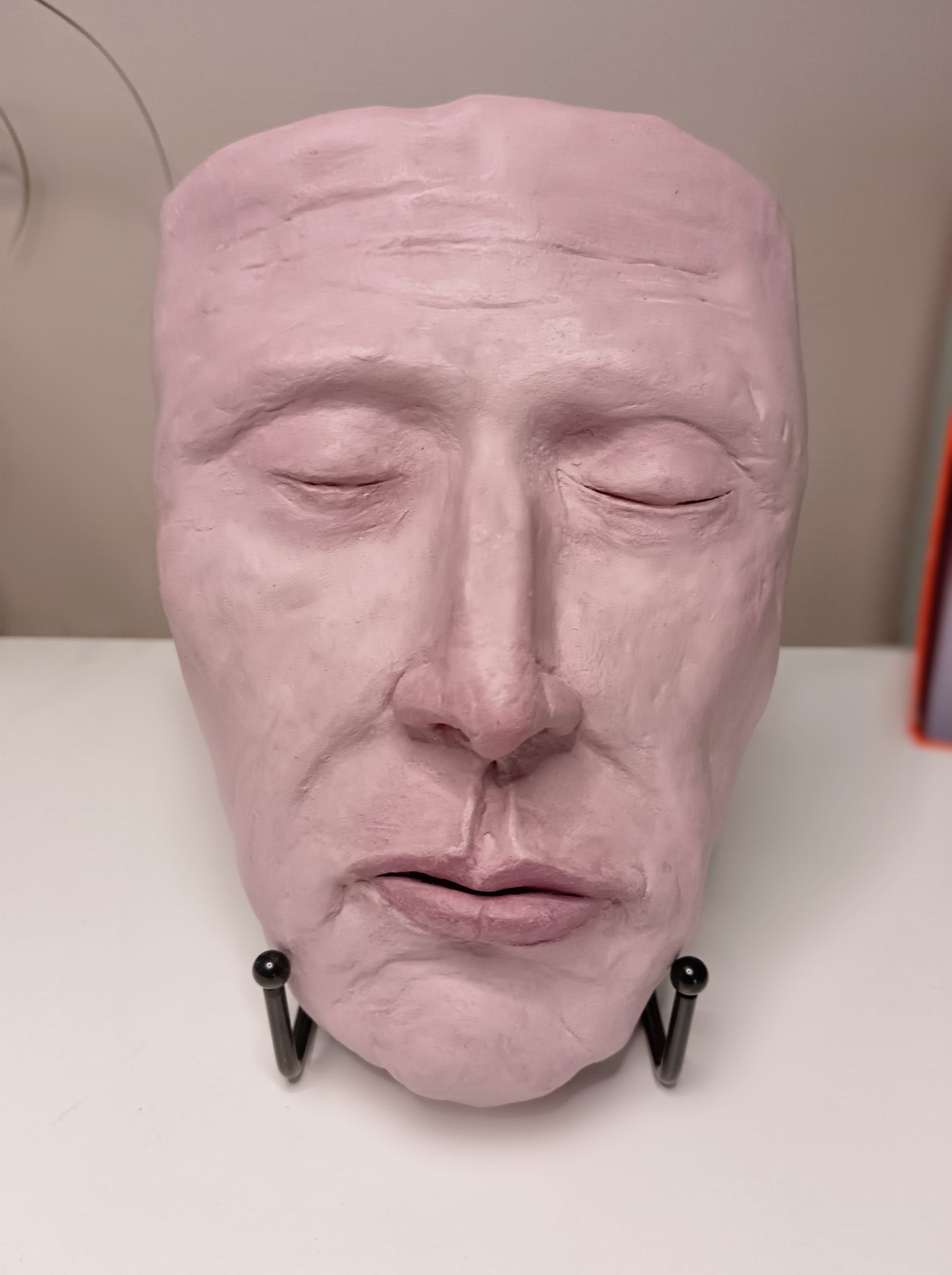Francis underwater, hand sculpted death mask sculpture with stand, home setting