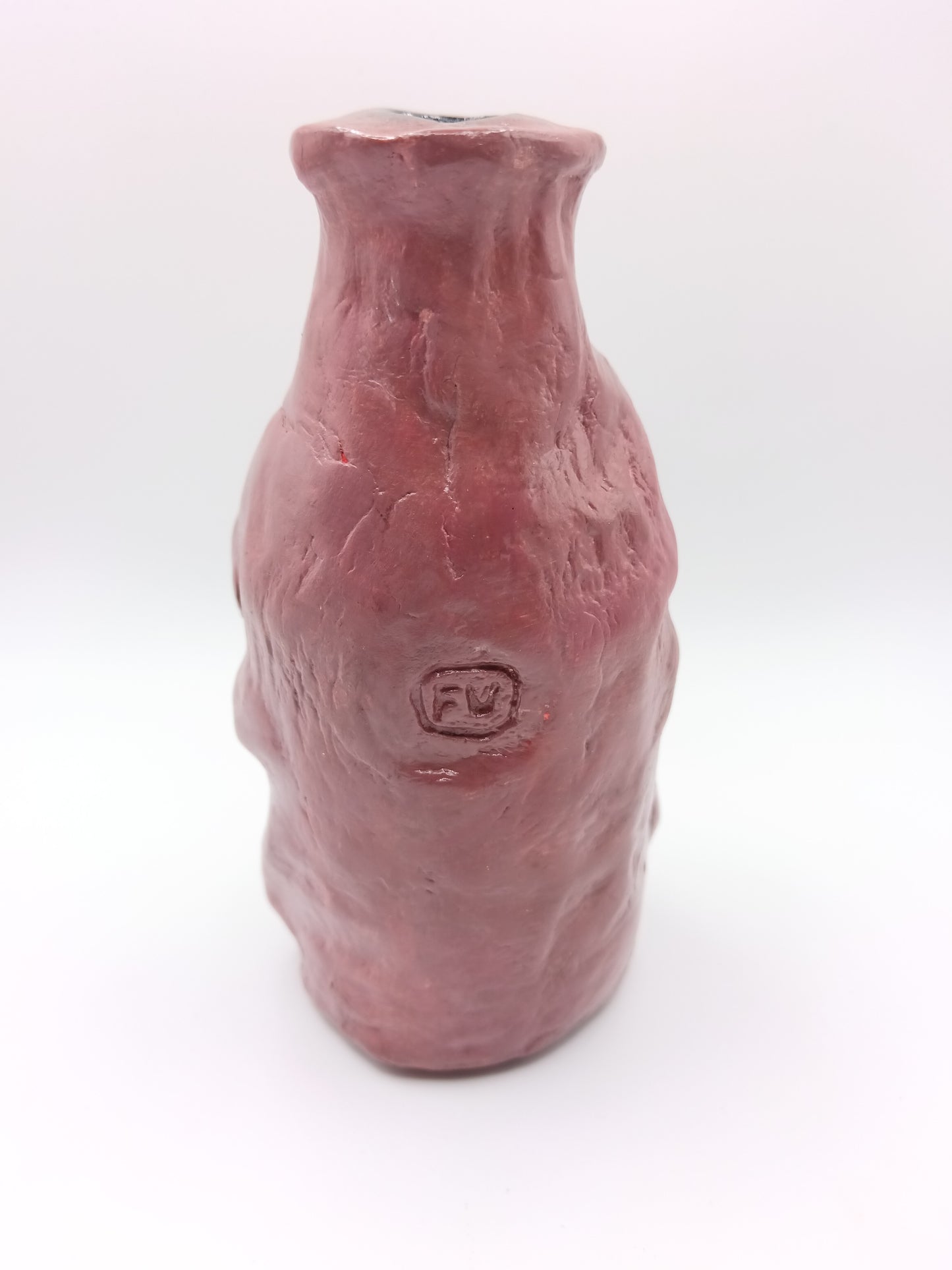 Handmade caricature face vase, back view