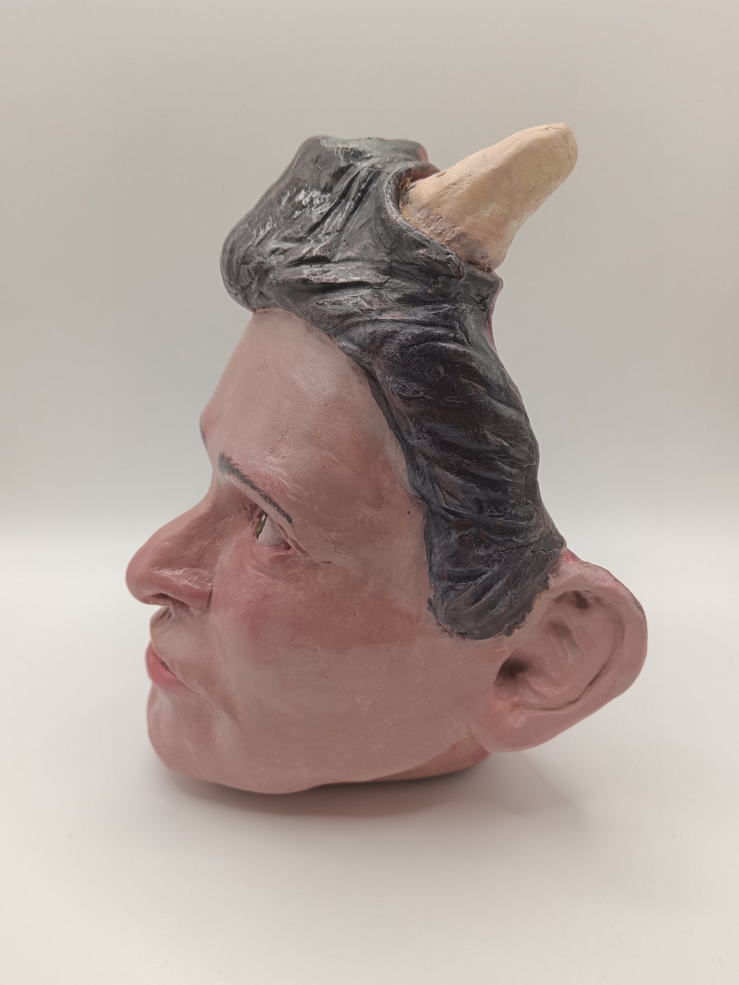 handmade devil boy vase, left side