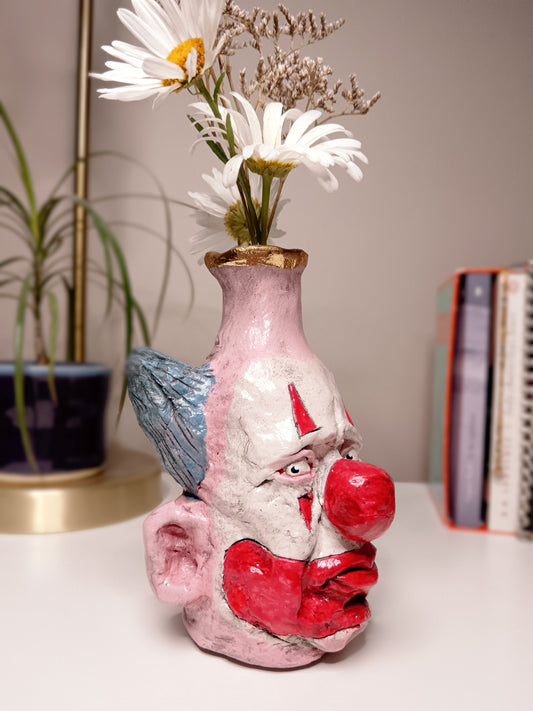 Francis Underwater, hand sculpted clown vase, home setting, side view