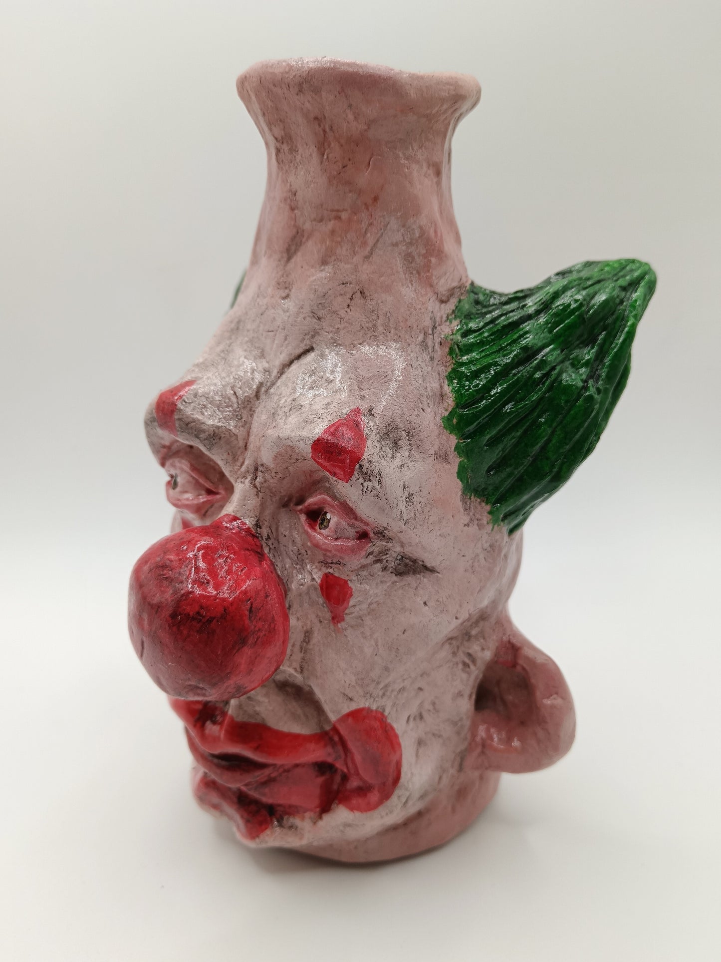 Handmade clown vases with green hair side view