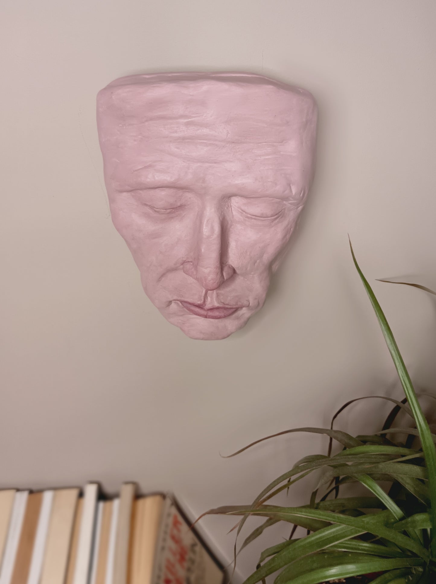 Francis underwater, hand sculpted death mask sculpture wall mounted home setting, top