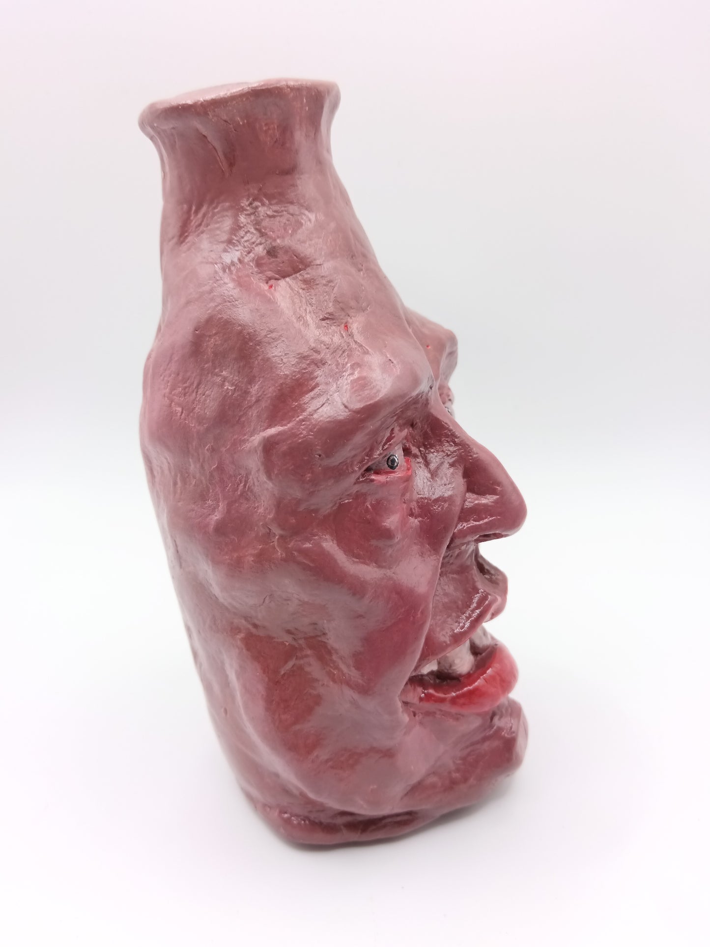 Handmade caricature face vase, right view