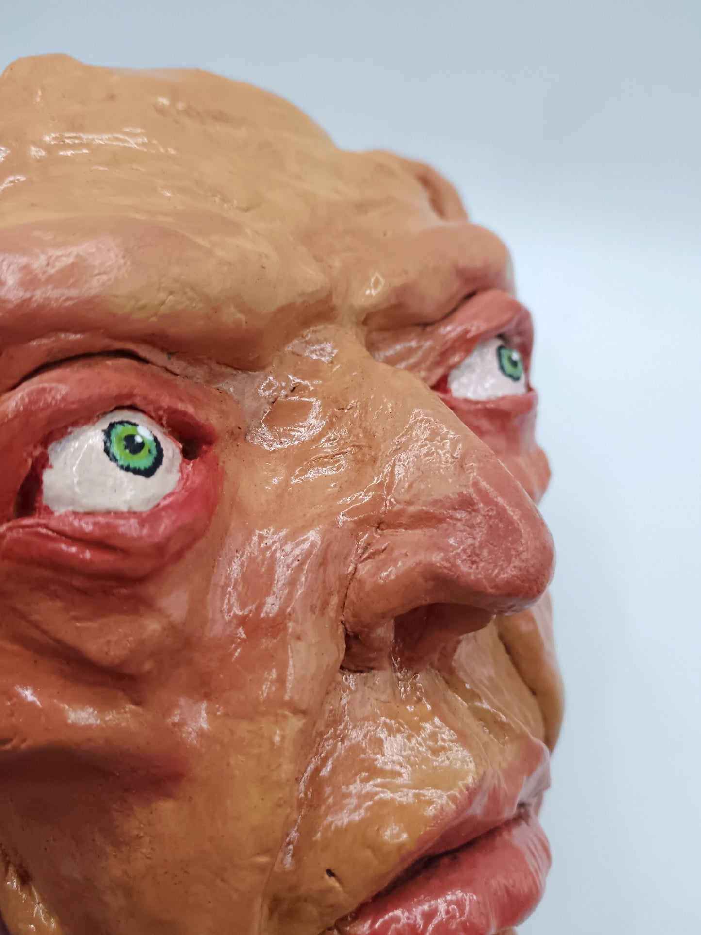 creepy yellow bear, hand sculpted clay sculpture mask close-up