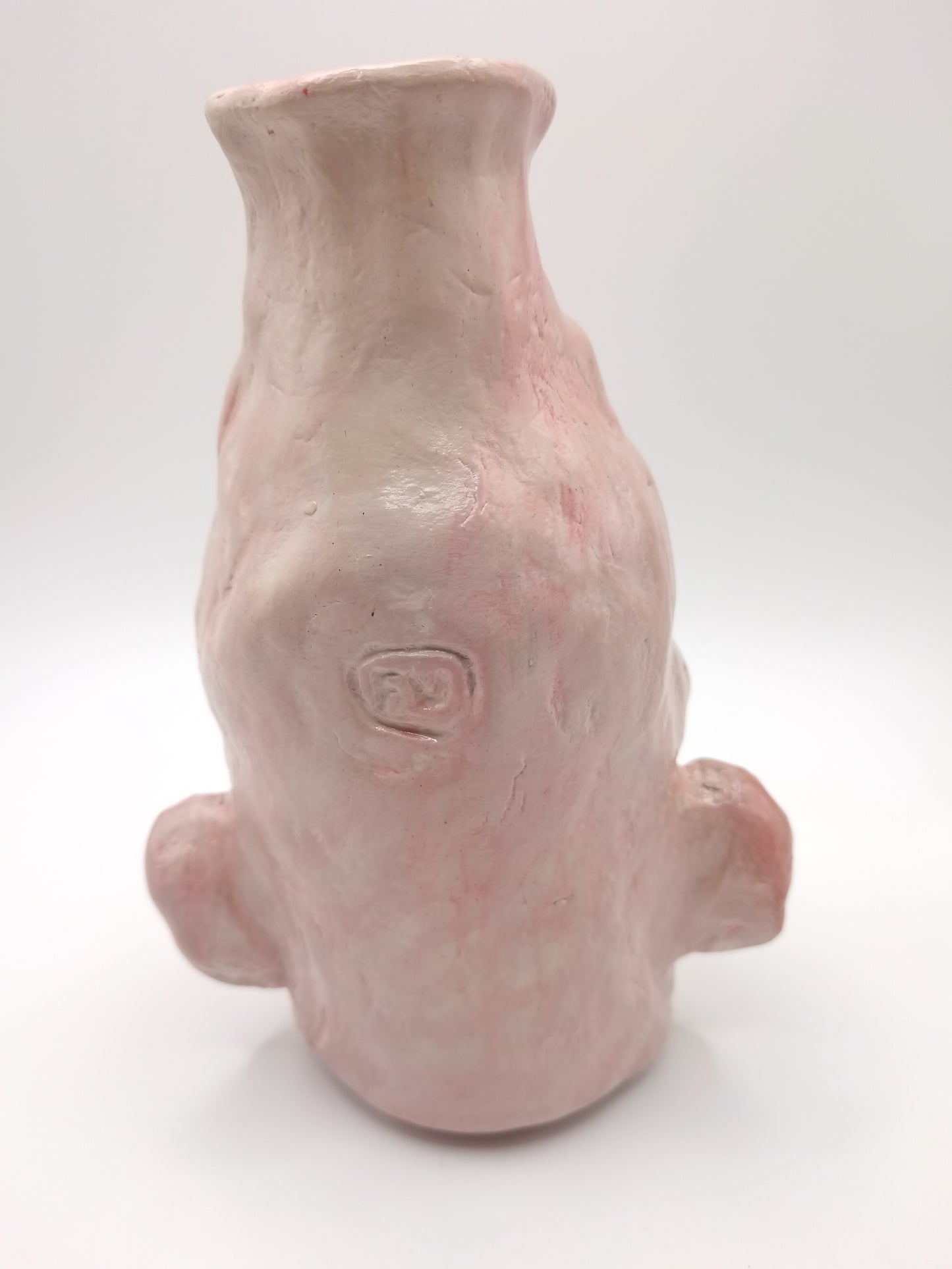 handmade realistic face vase, back view