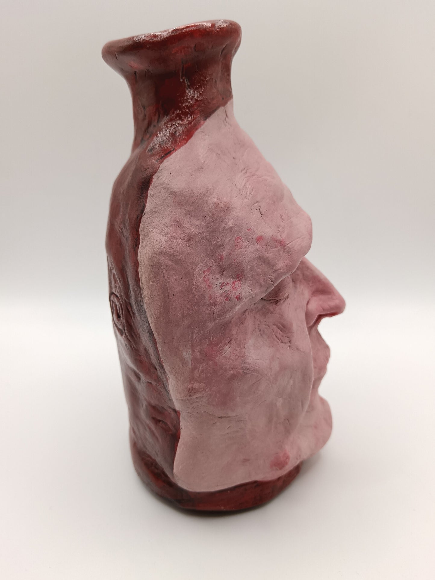 Handmade clay death mask vase, right side