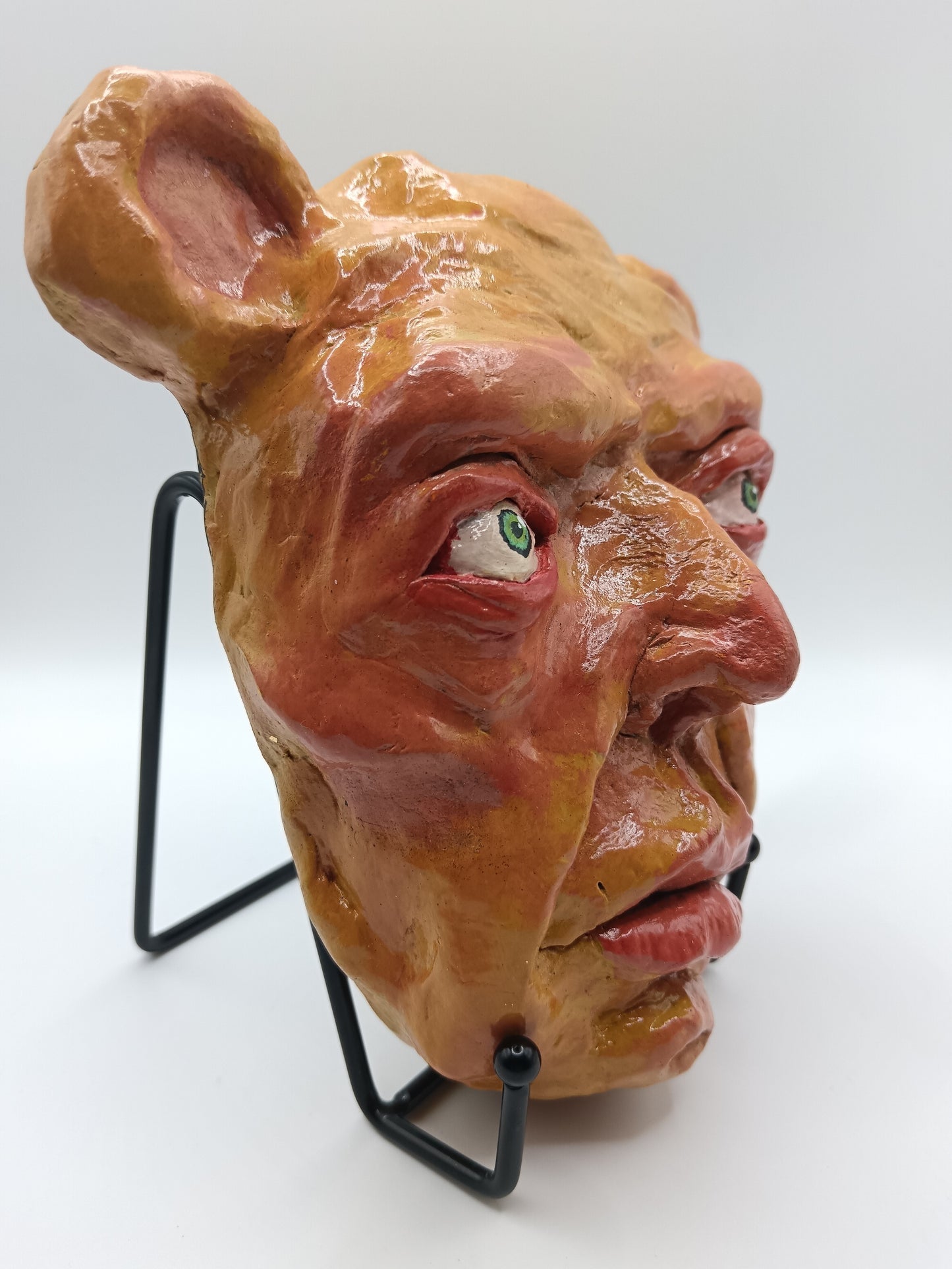 creepy yellow bear, hand sculpted clay sculpture mask with stand right view