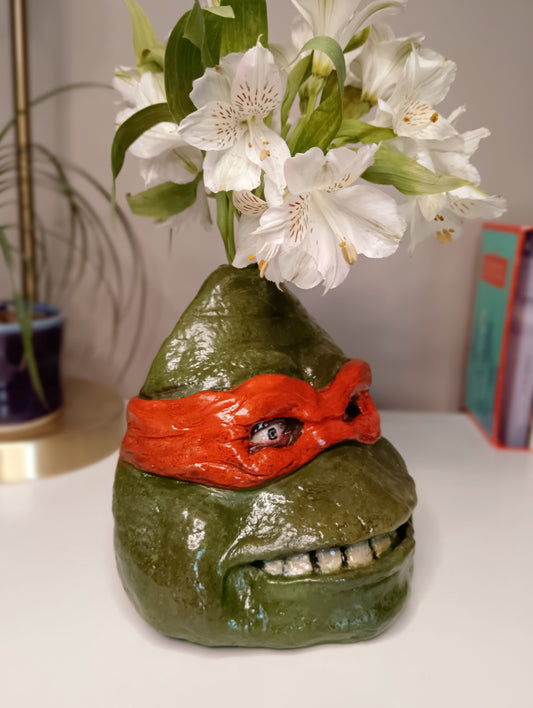 teenage mutant ninja turtles sculpture vase with flowers right view