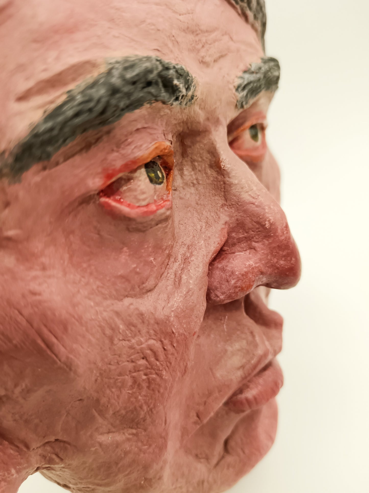 male clay sculpture close up