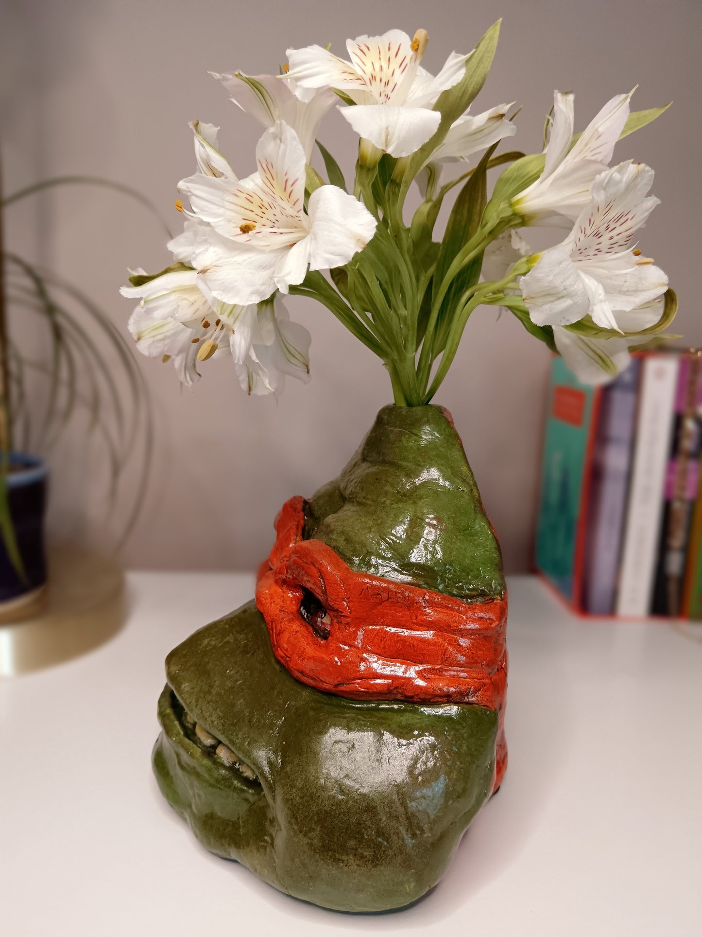 teenage mutant ninja turtles sculpture vase with flowers left view