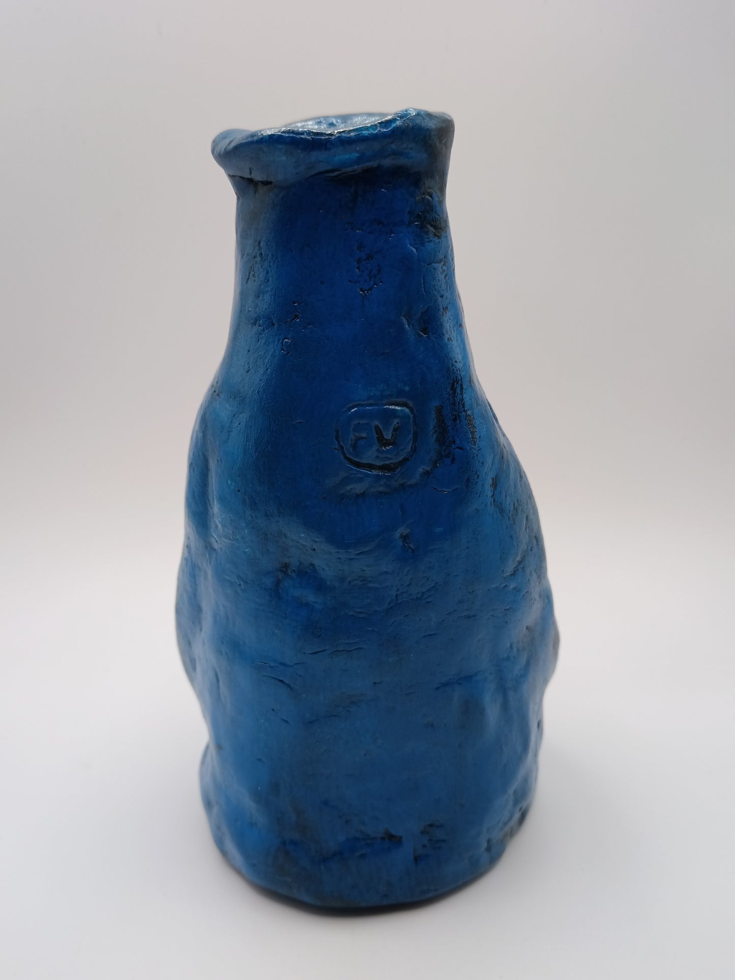 Hand sculpted blue face Vase - back view