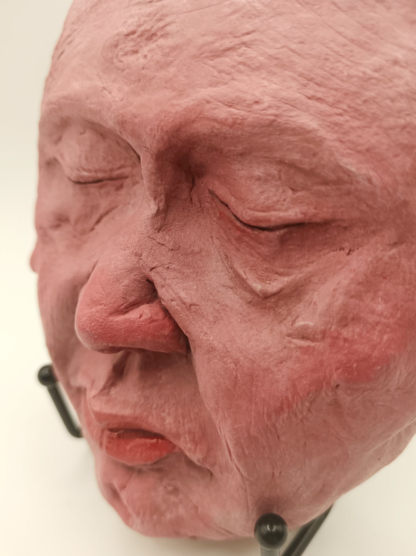 hand sculpted egghead sculpture, front close-up