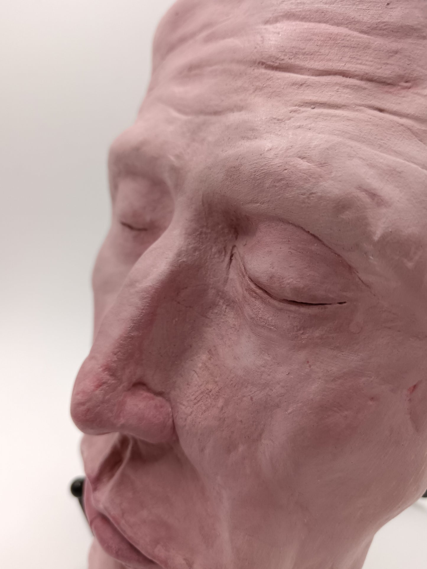 hand sculpted death mask sculpture close-up