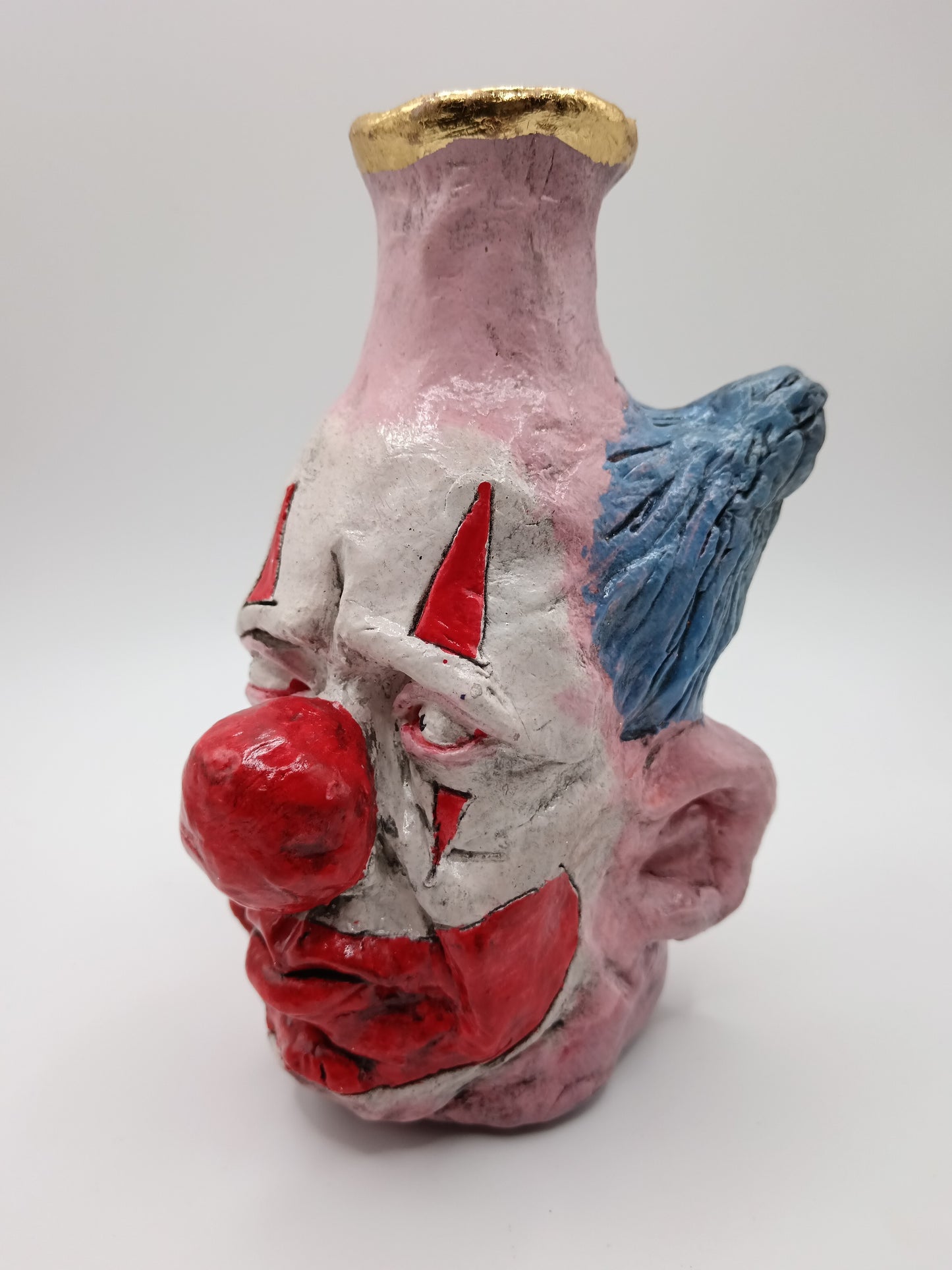 hand sculpted clown vase, left view