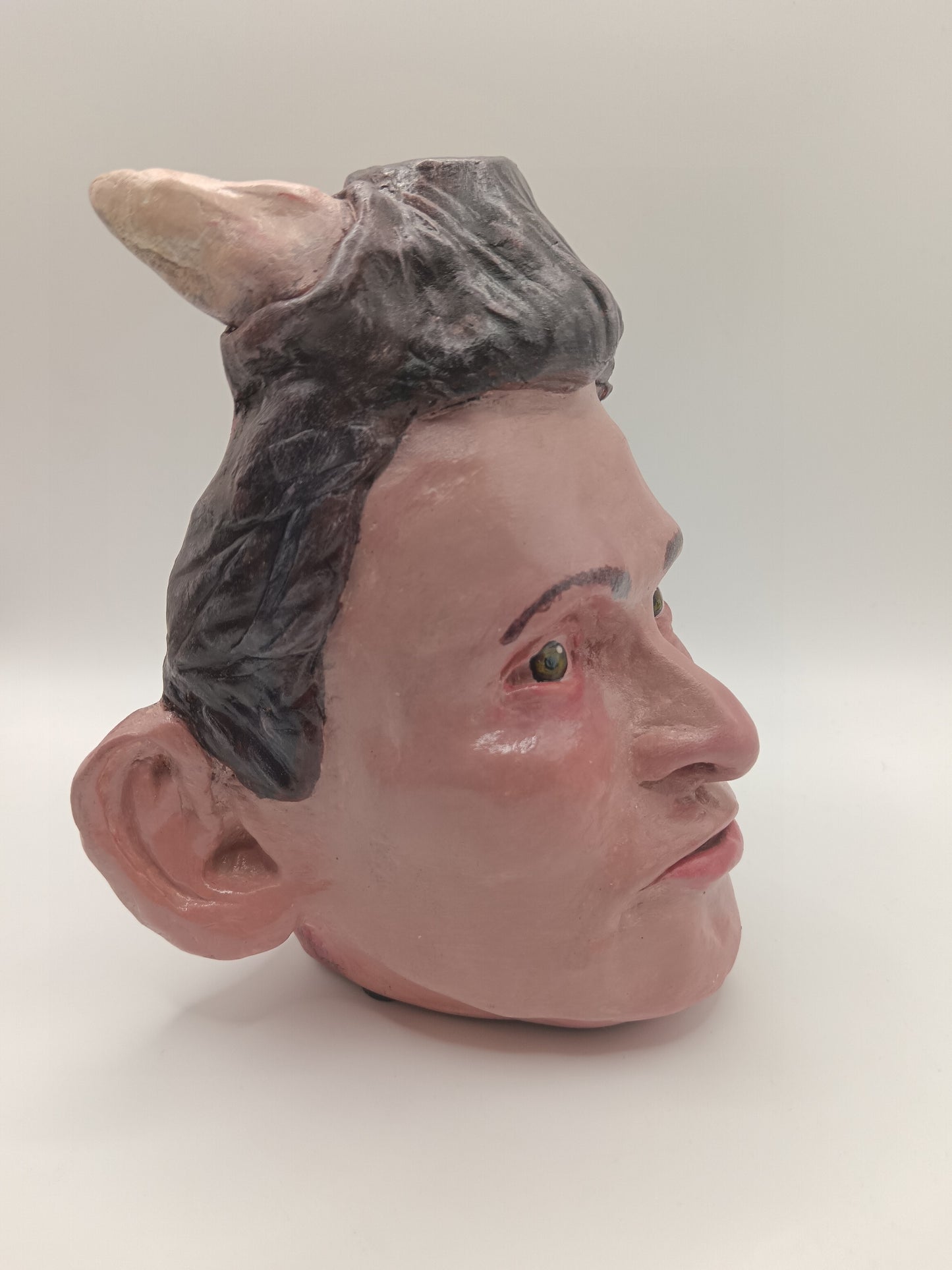 handmade devil boy vase, front right