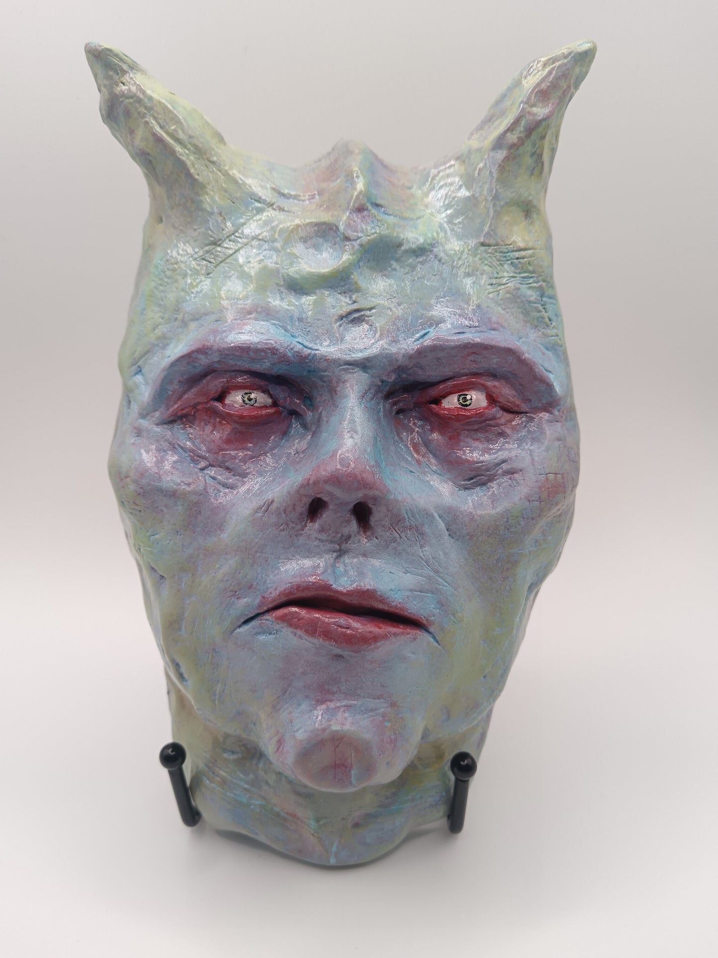Hand sculpted clay pastel demon sculpture with stand Francis underwater