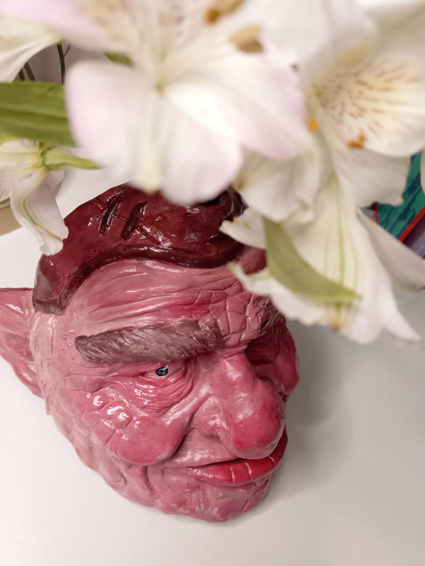 Hoggle Labyrinth sculpture vase top view with flowers