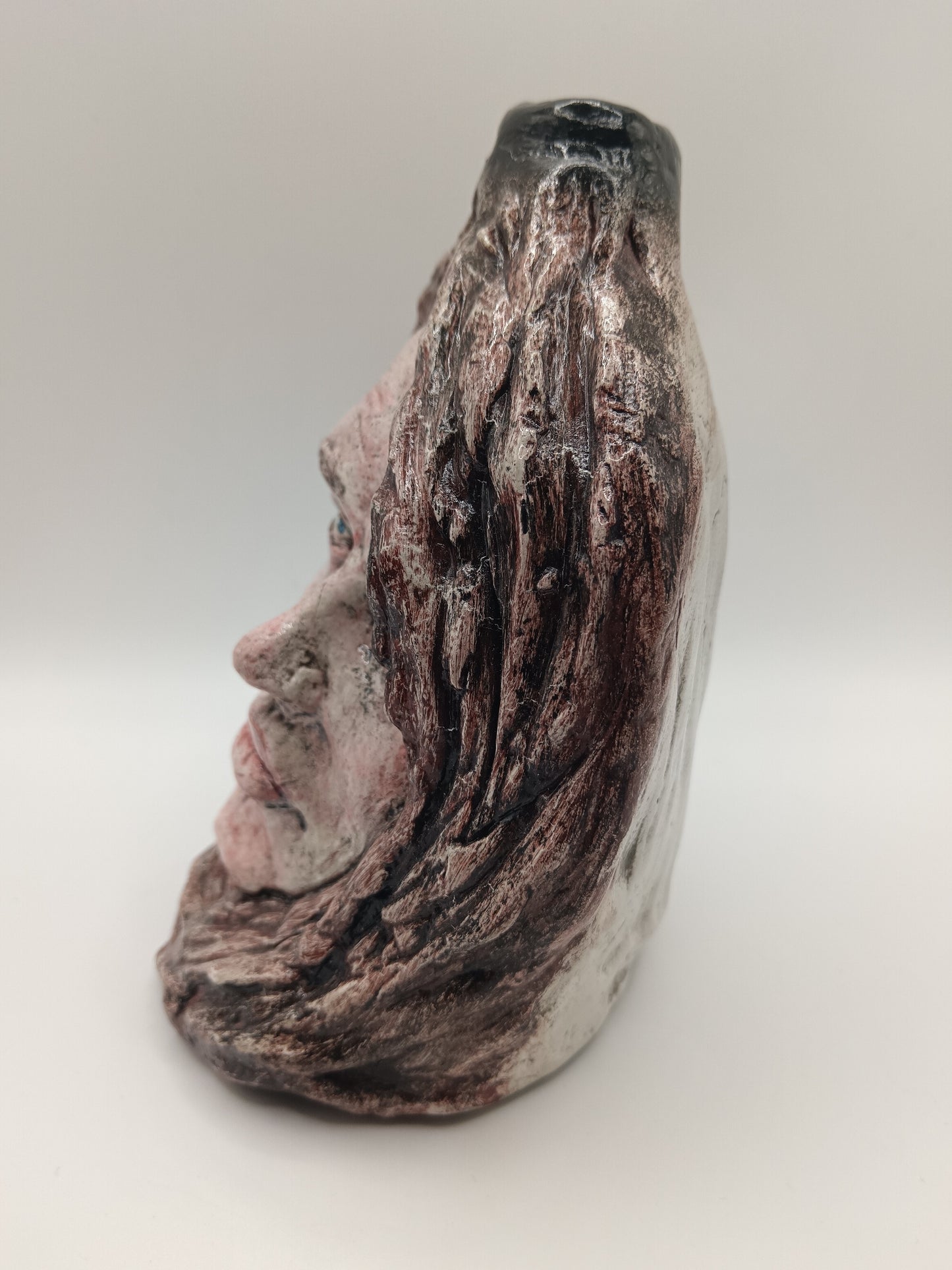 Handmade Female Portrait bud vase, left