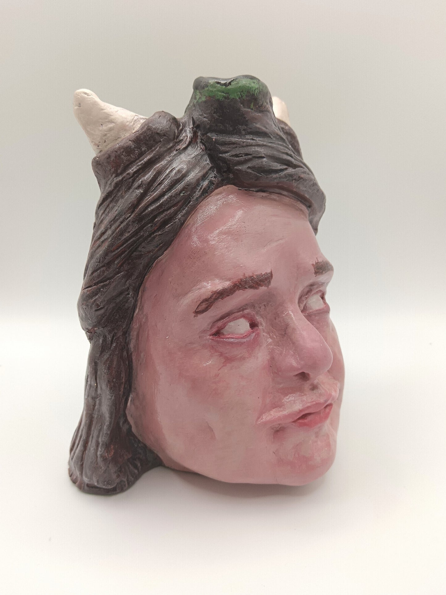 Handmade clay devil girl vase, front right
