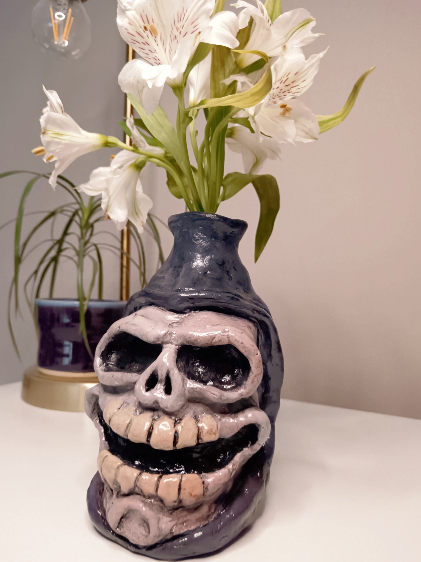 Hand made clay skull vase