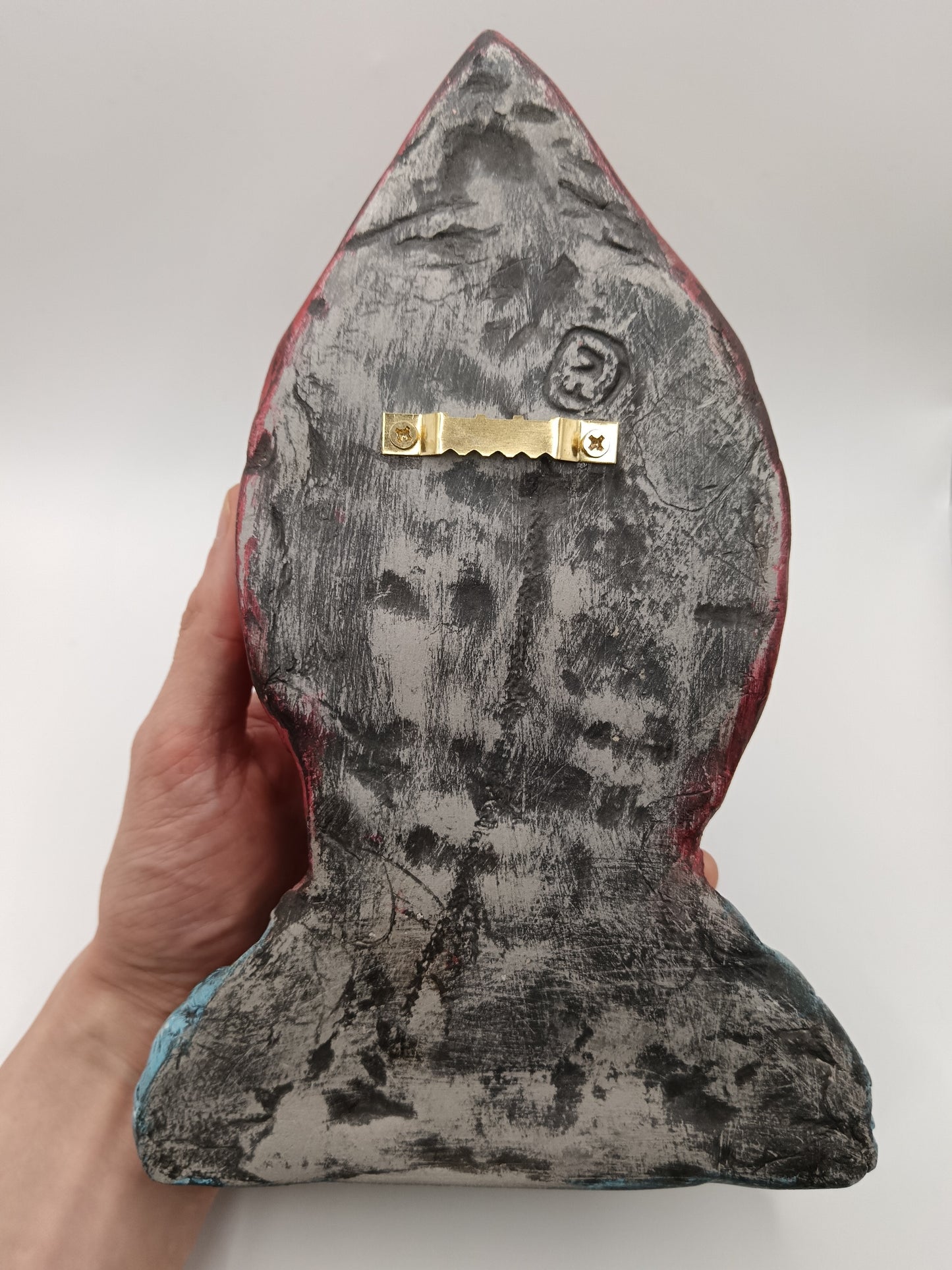 handmade airdry clay alien sculpture, back