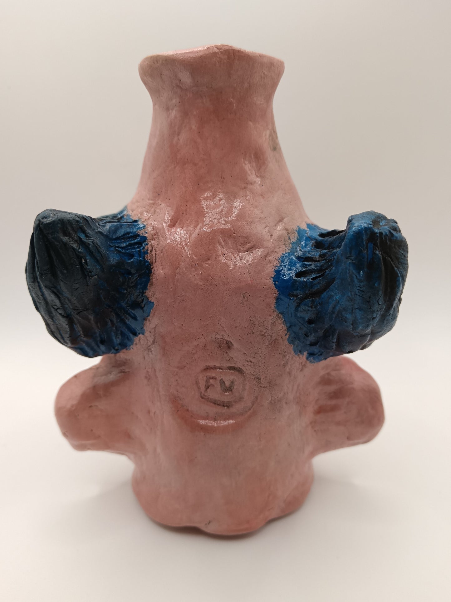Handmade clay clown vases with blue hair back