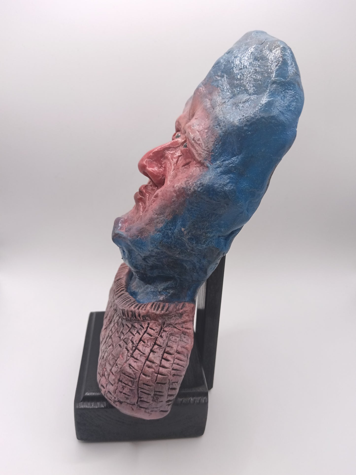 handmade clay alien sculpture, left side