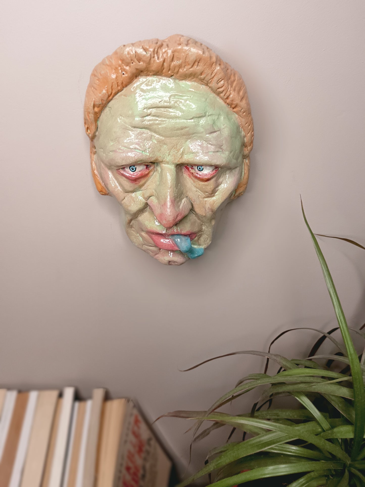 hand sculpted lizard man clay sculpture wall hanging top