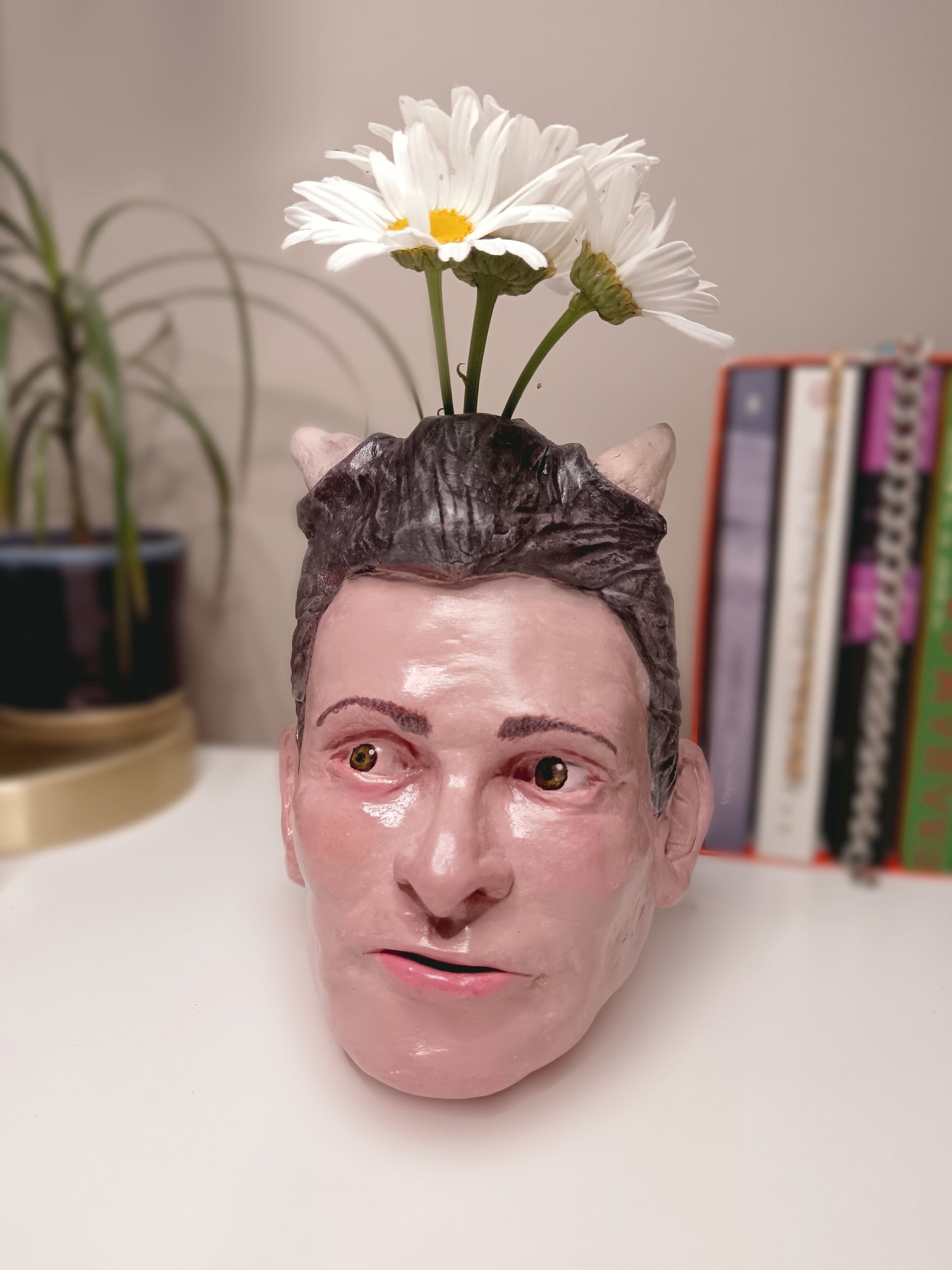 Francis Underwater handmade devil boy vase, home setting with flowers