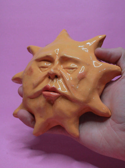 Ceramic Sun Wall Ornament - Closed Eyes