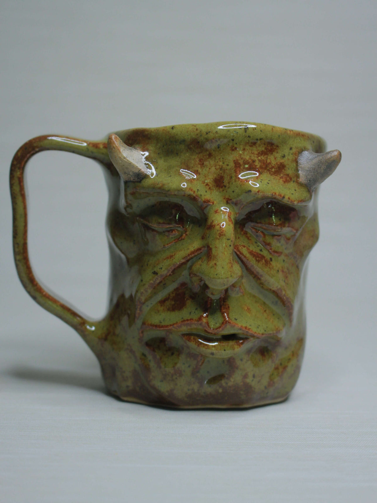 Green Goblin Face Mug -  Creepy Hand Sculpted Ceramic Mug