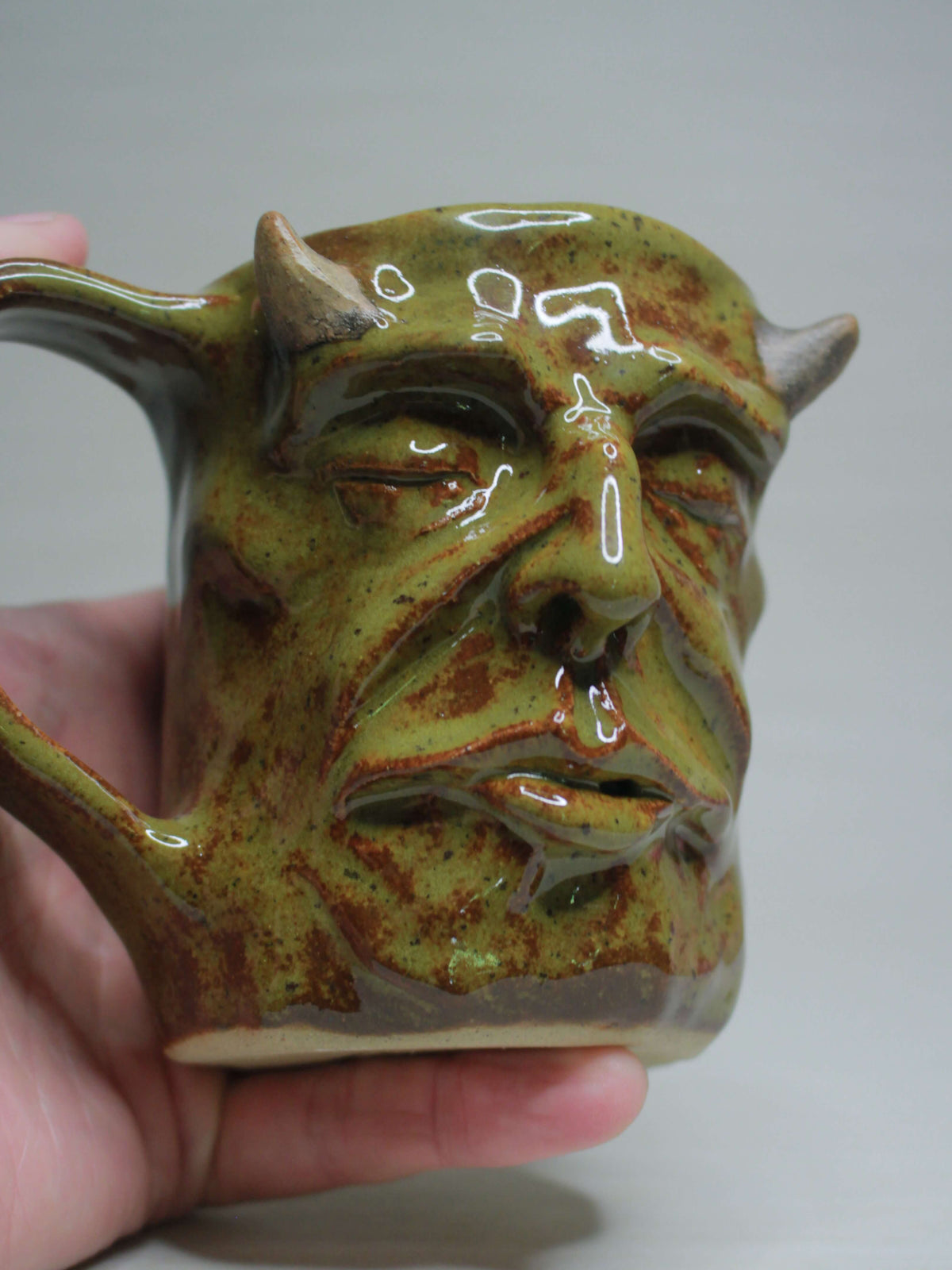 Green Goblin Face Mug -  Creepy Hand Sculpted Ceramic Mug