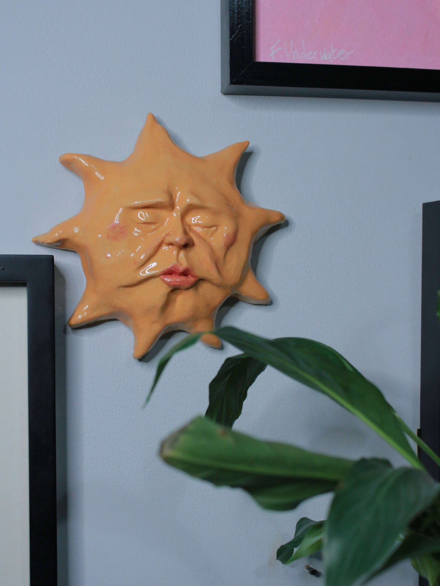 Ceramic Sun Wall Ornament - Closed Eyes