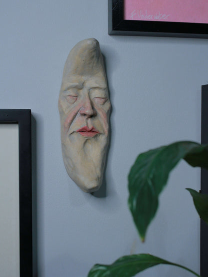 Pale Crescent Moon Ceramic Wall Ornament - Closed Eyes