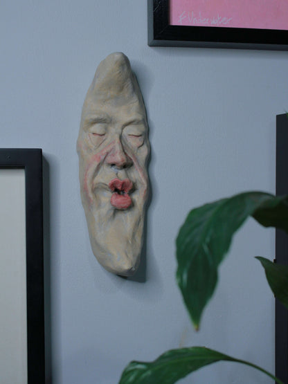 Pale Crescent Moon Ceramic Wall Ornament - Kissing Face