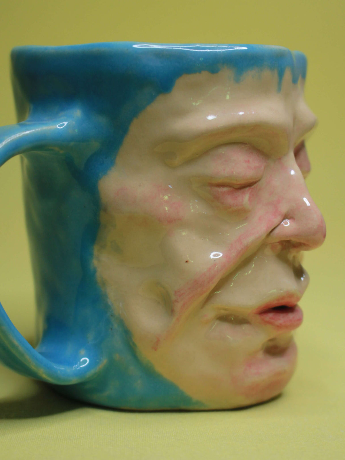 Quirky Hand Sculpted Blue Face Mug - Handmade Ceramic Character Drinkware