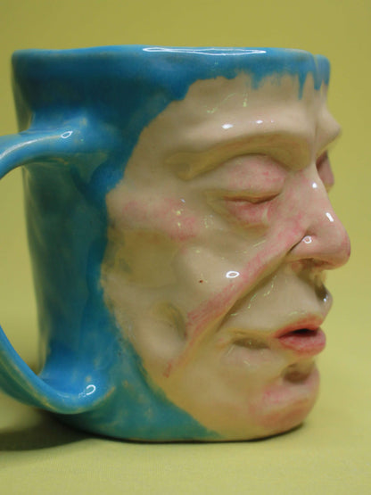 Quirky Hand Sculpted Blue Face Mug - Handmade Ceramic Character Drinkware