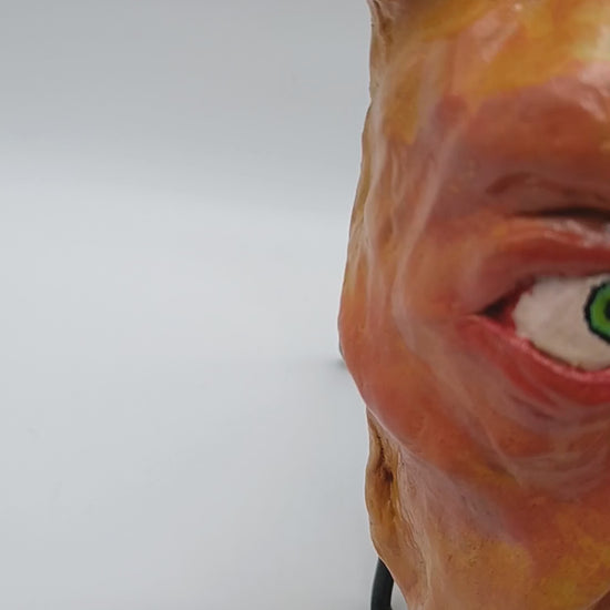 creepy yellow bear, hand sculpted clay sculpture mask lightbox video