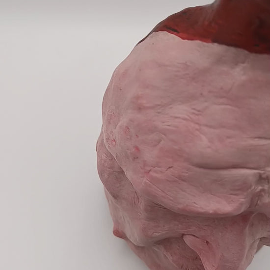 Handmade clay death mask vase, studio video