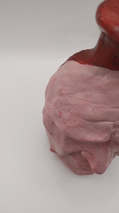 Handmade clay death mask vase, studio video