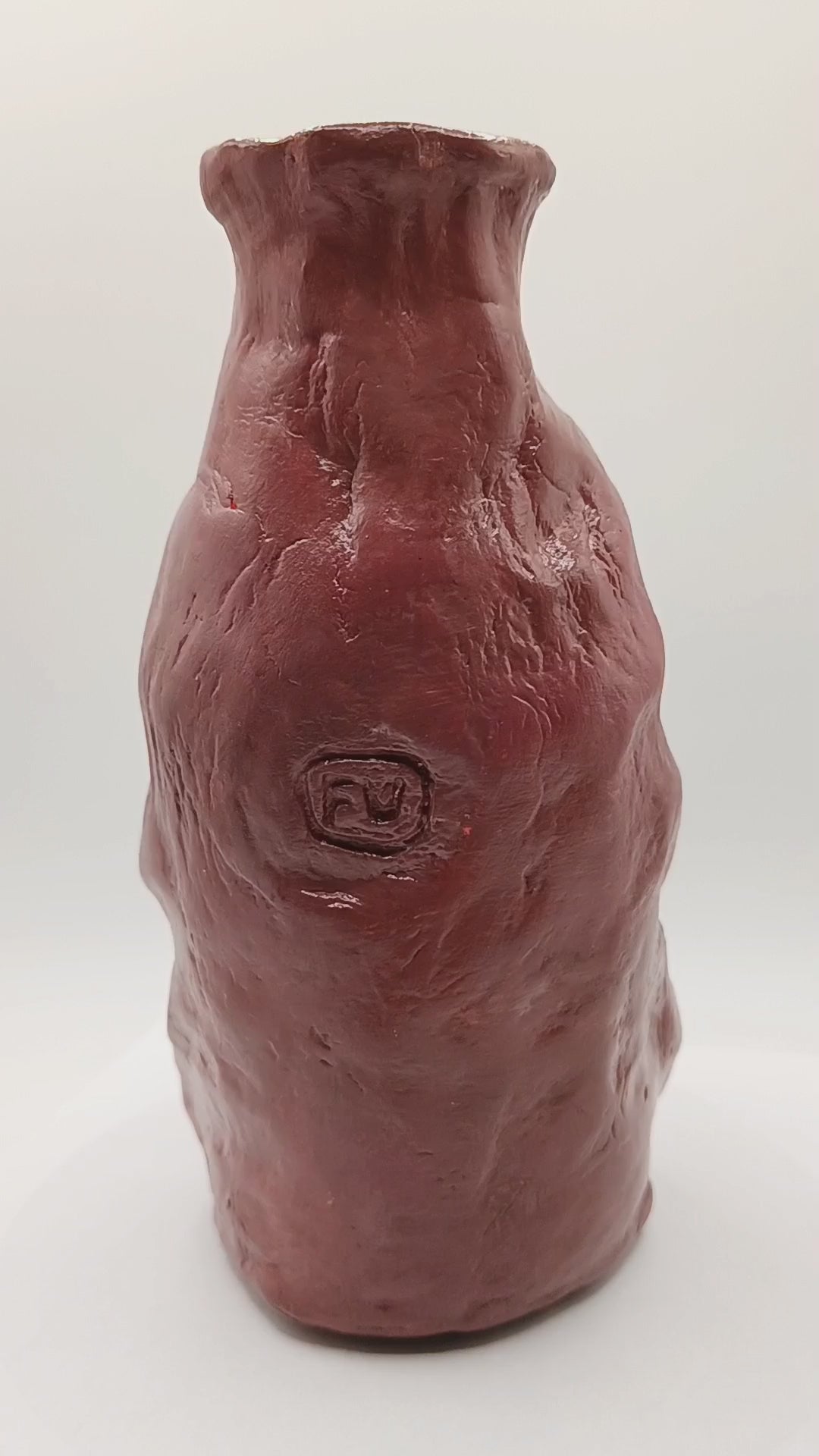 Handmade caricature face vase, 180 degree view video