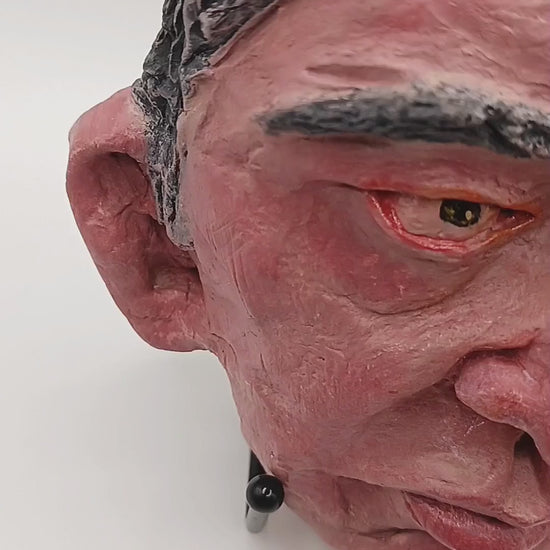 male clay sculpture lightbox video