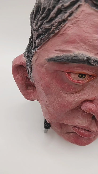 male clay sculpture lightbox video