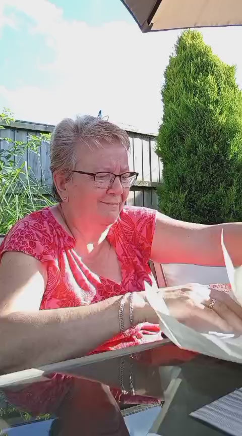 client opening her portrait commission hand sculpted in the uk