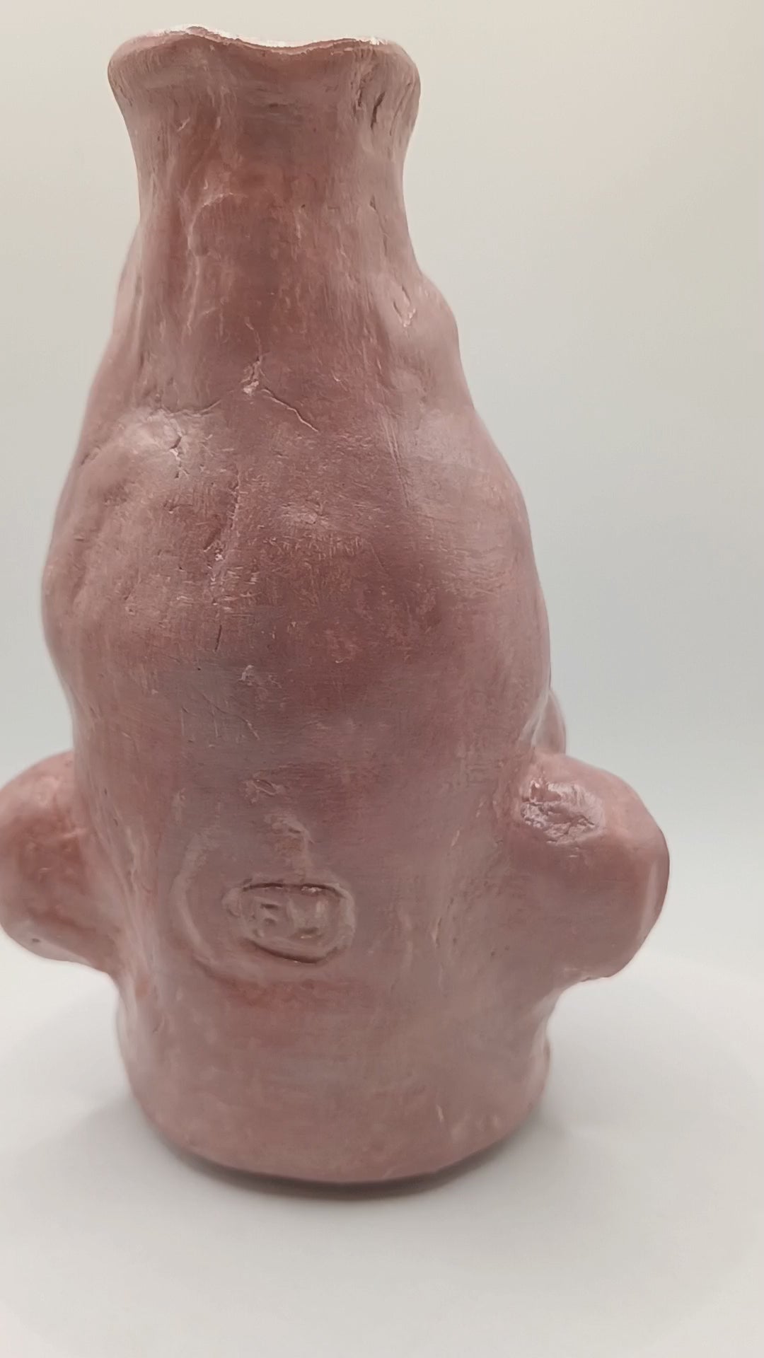 handmade closed-eye clay face vase, 180 degree video 