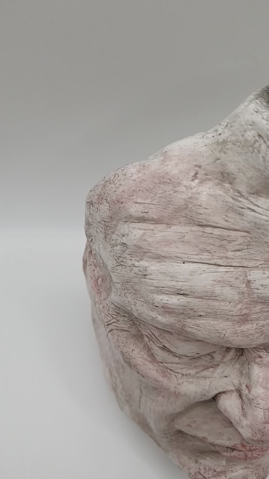 Airy dry clay vase - male face, lightbox video