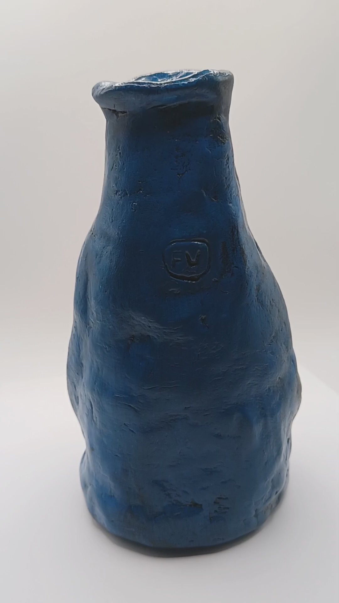 Hand sculpted blue face Vase - 180 degree video 