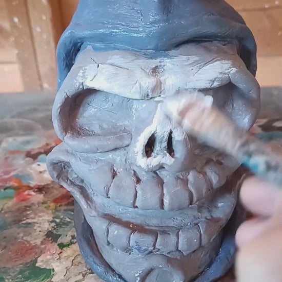 hand painting clay skull vase video
