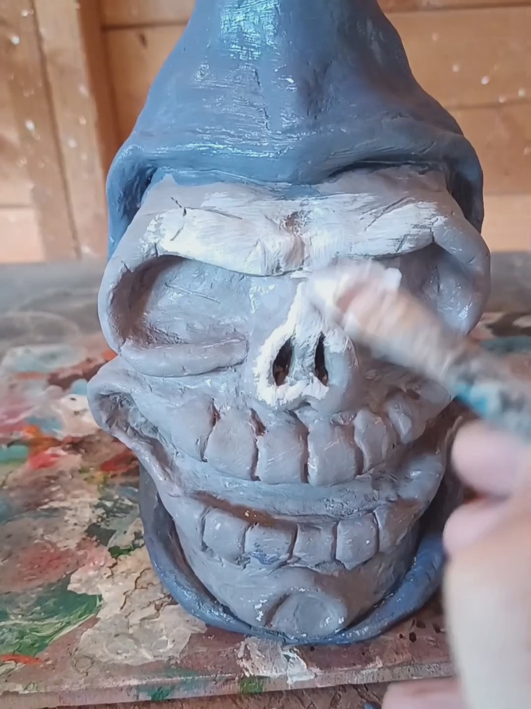 hand painting clay skull vase video
