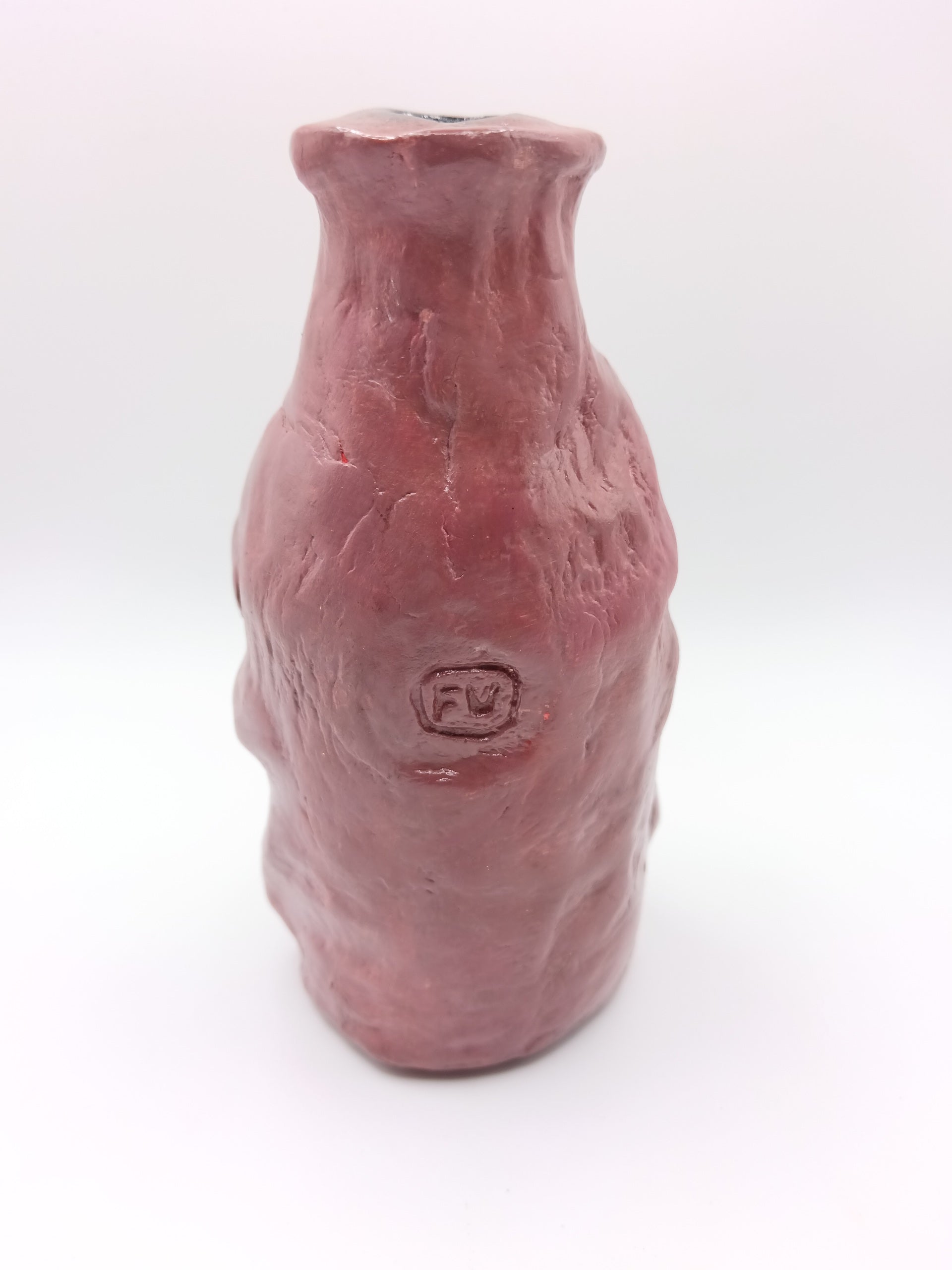 Handmade caricature face vase, back view
